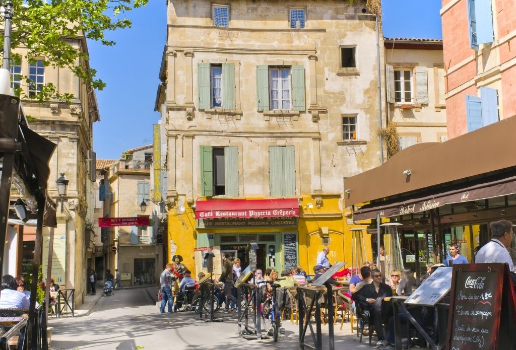 Market place with cafes in Arles, Provence